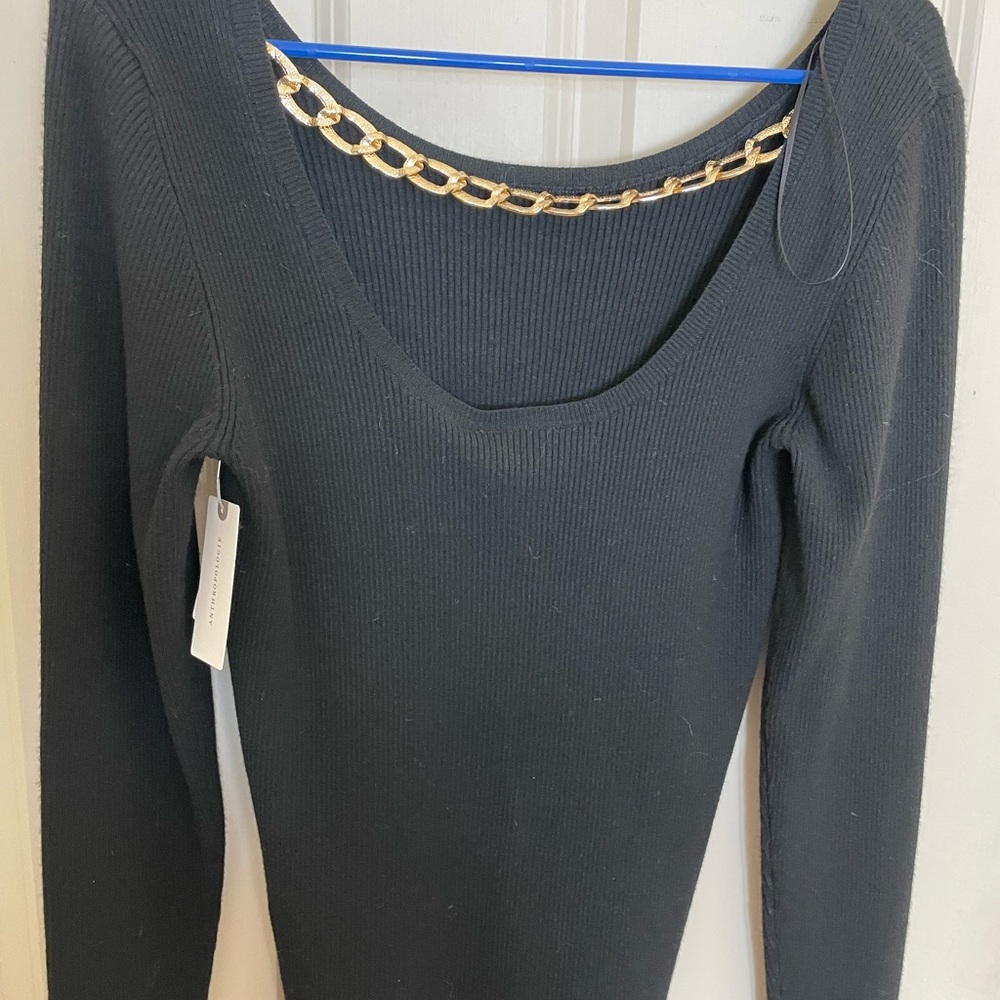 Elie Tahari NWT tight fitting black shirt with gold chain, embellishment on back
